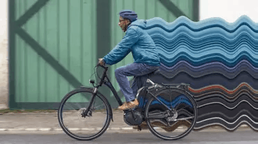 Man Riding an Electric Bicycle